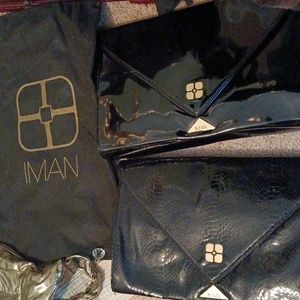Brand new IMAN black vintage envelope clutch. Set of two.